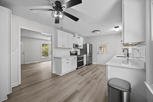 Building Photo - Fantastic Corner Lot, Updated 4 Bedroom Sp...