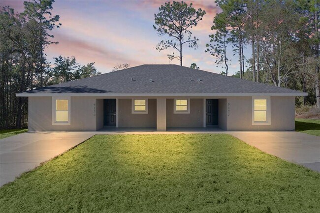 Foto del edificio - 9170 N Travis Dr