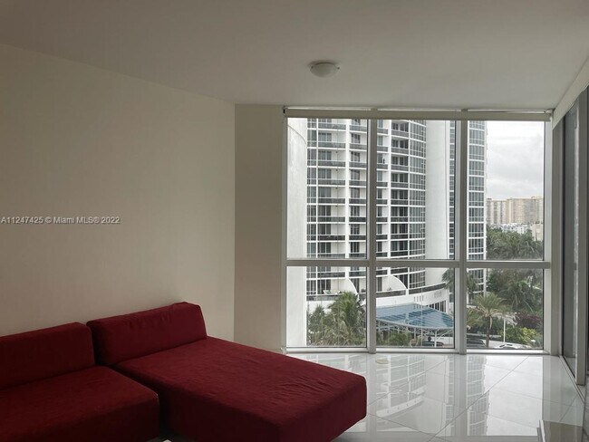 Building Photo - 18201 Collins Ave