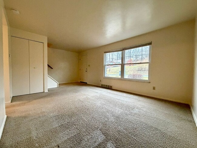 Photo - Stunning 2 BR Townhouse with Attached Garage! Central A/C & MORE!! CALL TODAY TO SCHEDULE A TOUR!