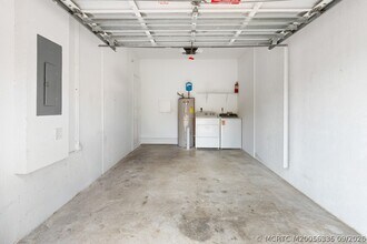 Building Photo - 4964 SE Mariner Garden Cir