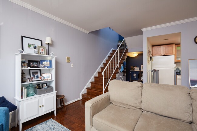 Stairs to landing (skylight above). - 1957 Calvert Street Northwest