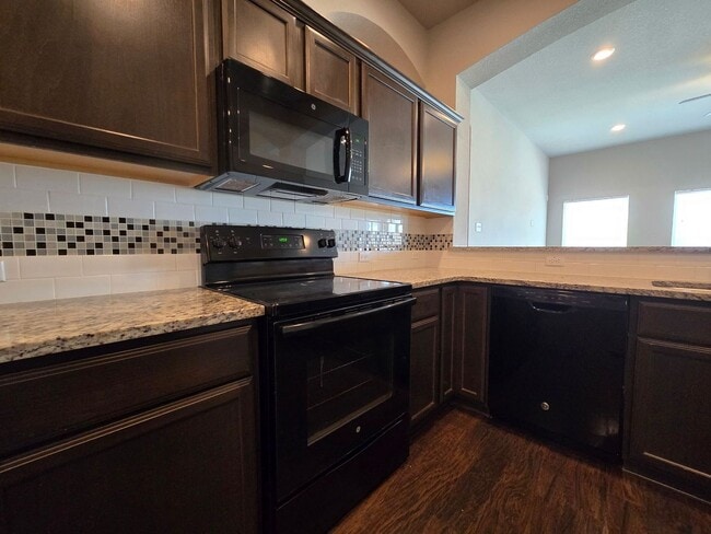 Building Photo - RENT REDUCTION - AVAILABLE NOW!