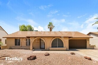 Building Photo - 6015 W Poinsettia Dr