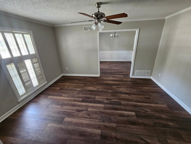 Photo - Spacious 3BR/2BA Memphis Rental with 2-Car Garage, High Ceilings & Screened Porch House