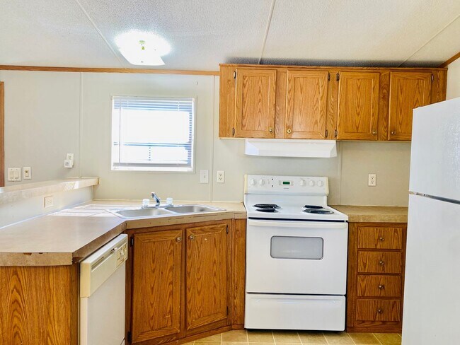 Foto del edificio - Cute 2 bed/1 bath mobile home in Opelousas