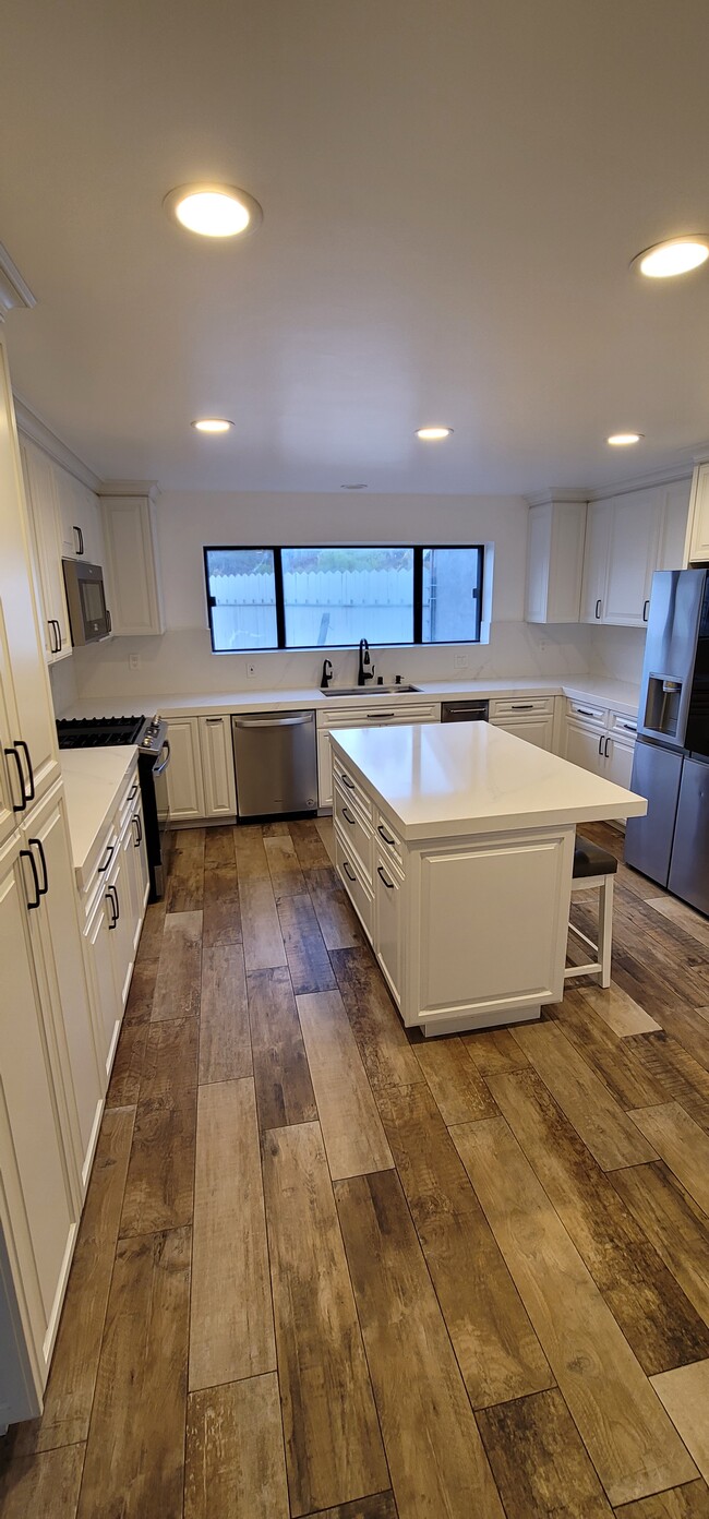 New Custom Kitchen, huge island and stone counters - 5513 Riggs Rd