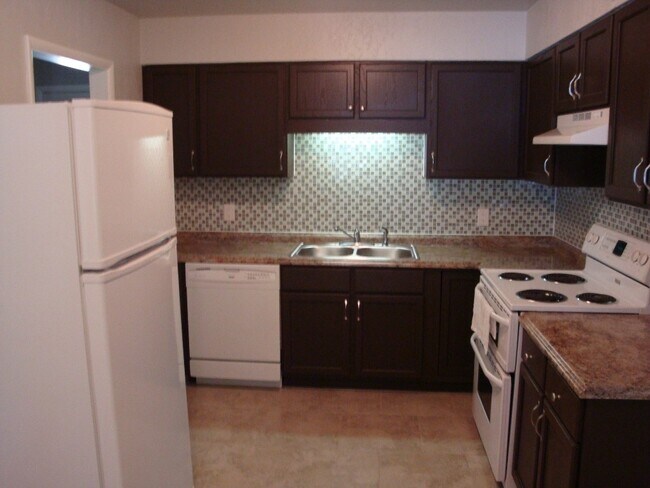 Building Photo - 1591 S 67th E Ave