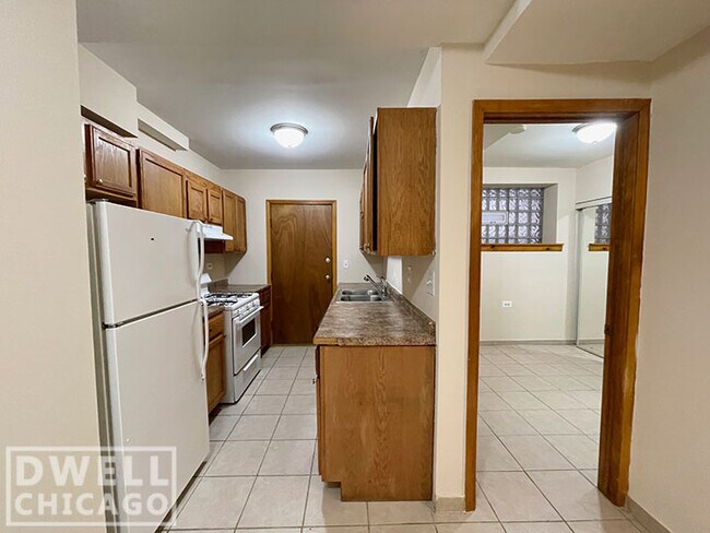 Foto del edificio - 6357 N Lakewood Ave