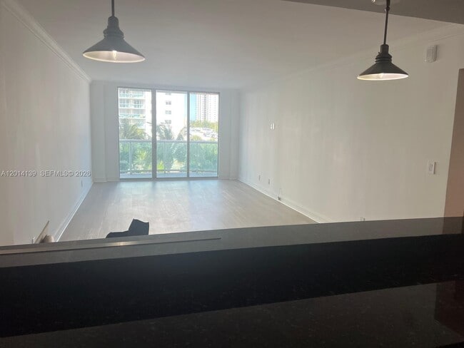 Building Photo - 19390 Collins Ave
