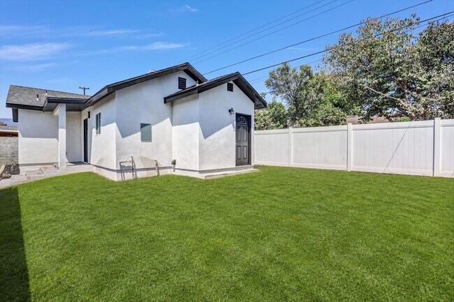 Building Photo - 9983 Vernon Ave