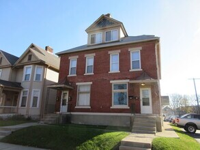 Building Photo - 235-237-237 W 8th Ave