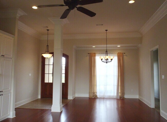 Building Photo - Custom 4 bedroom home in Manchac Harbor/Pr...