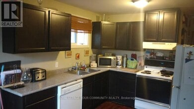 Building Photo - 381 The Queensway S