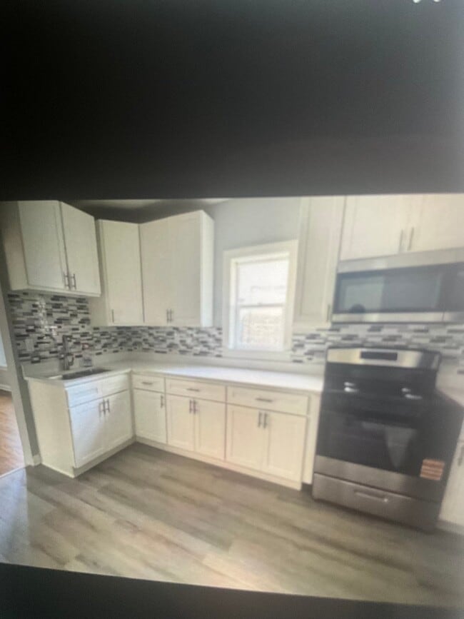 Photo - 7847 S Bennett Ave Apartment