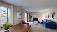 Located at 5191 Fairway Lakes Dr. in Columbus, Ohio, this single-floor residence offers a well-designed layout with comfortable living spaces throughout. The open living and dining area is bright and welcoming, featuring plush carpeting, large sliding glass doors that lead to a private outdoor patio, and abundant natural light from multiple windows. A wood-framed fireplace serves as the focal point of the living room, adding warmth and character to the space.

The kitchen is thoughtfully appointed with white cabinetry, light countertops, a double-basin sink, and black appliances including a range, dishwasher, microwave, and refrigerator. Track lighting and wood-look flooring complete the functional and clean aesthetic. A dedicated dining area with generous natural light sits adjacent to the kitchen and living space.

The bedroom is spacious and carpeted, featuring multiple windows that allow ample natural light, and includes access to a walk-in closet for generous storage. The bathroom is outfitted with a full tub-shower combination, wood-look flooring, and clean, simple finishes. Textured ceilings are present throughout, and neutral wall tones create a cohesive, move-in-ready atmosphere across all rooms.