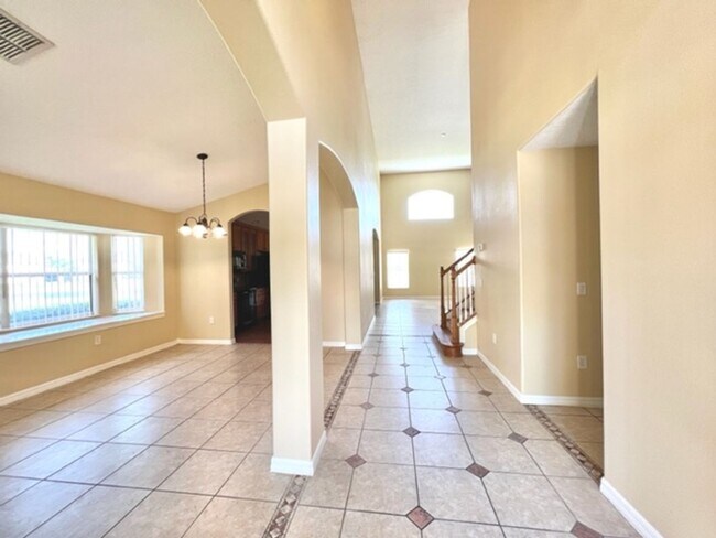 Building Photo - EAGLE CREEK LAKE NONA! WELCOME HOME! Beaut...