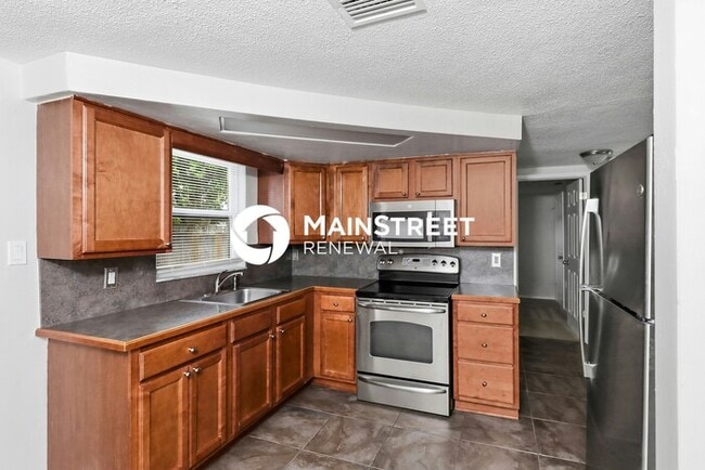 Building Photo - 3 Bedroom Pet-Friendly Home in Port Richey, FL with Main Street Renewal