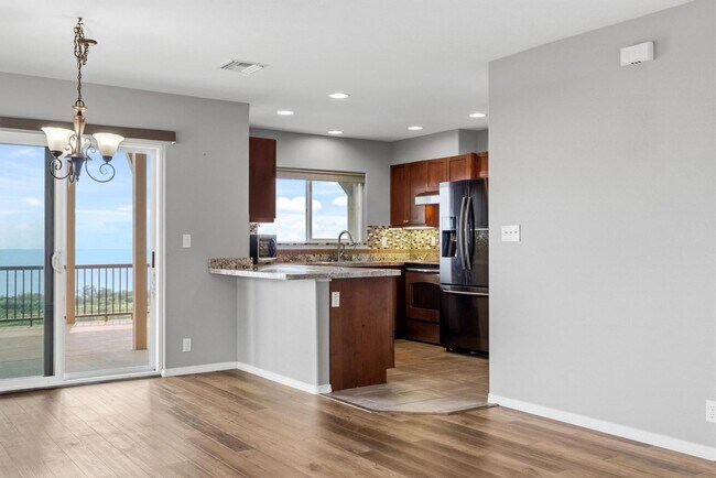Building Photo - 3 bedroom, 2.5 bath with extra room and sweeping coastline views!