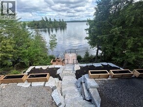 Building Photo - 5789 Kennisis Lake Rd