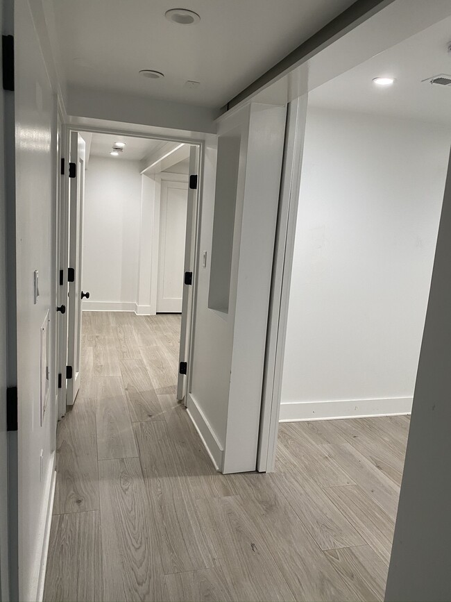 Hallway leading to den (right) and master (straight back) - 2915 28th St NW