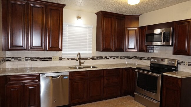 Building Photo - 9219 Carousel Ln
