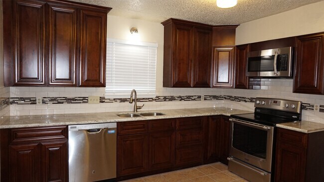 Foto del edificio - 9219 Carousel Ln