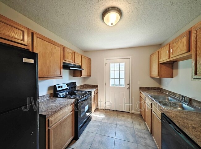 Building Photo - 8127 Cocoa Ave