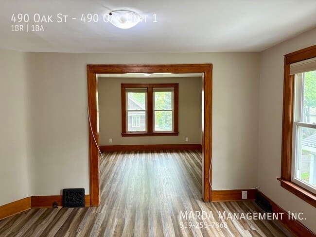 Building Photo - SPACIOUS 1-BEDROOM PLUS DEN/1-BATH UNIT +H...