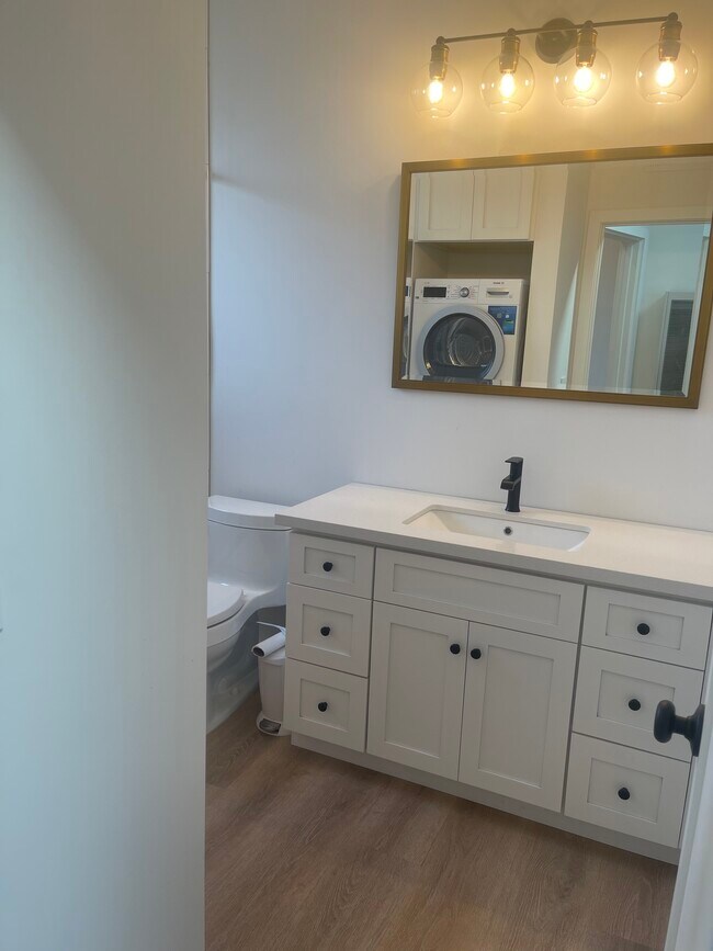 Bathroom with washer and dryer. - 747 Vasques Dr