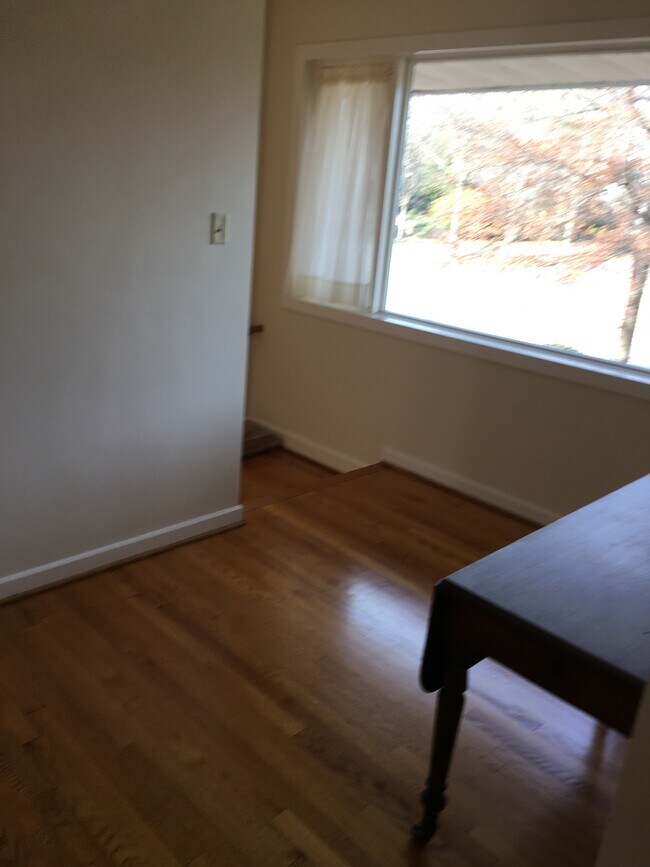 entrance foyer leads to stairs to Mill St entry - 255 Mills Ave