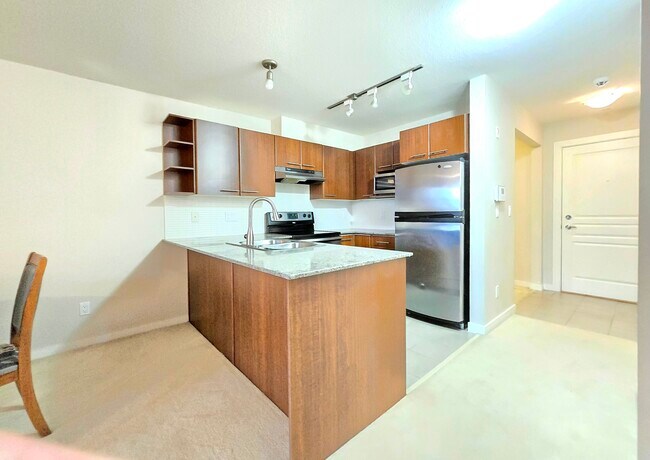 Photo du bâtiment - 115-4728 Brentwood Dr