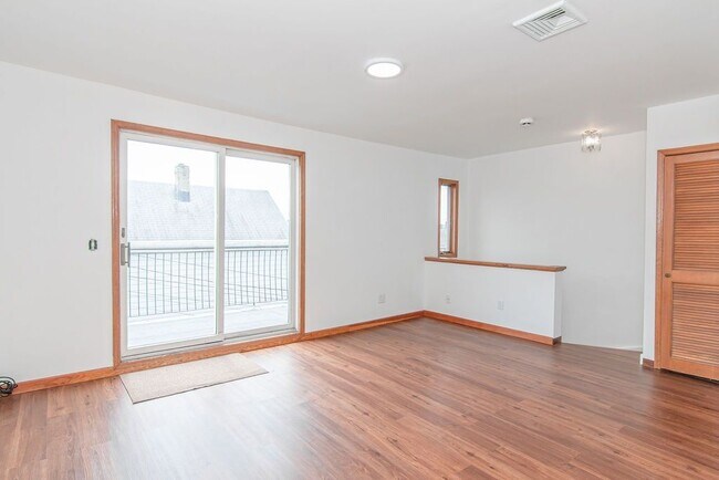 Living Room with Private Balcony - 2 Chase Ct