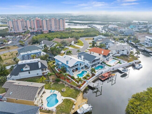Building Photo - Waterfront Living in a 4-Bed, 3-Bath Oasis at 6029a Bayway Court, New Port Richey!