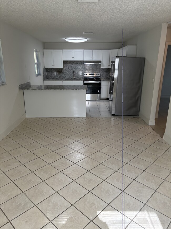 Building Photo - 7133 Pinewood Dr