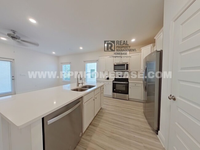 Building Photo - Stunning New Townhome Near Beaches – Move ...