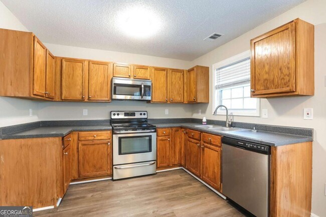 Foto del edificio - 6961 Mahonia Pl