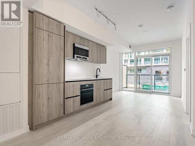 Photo du bâtiment - 117-2117 Broadway Ave