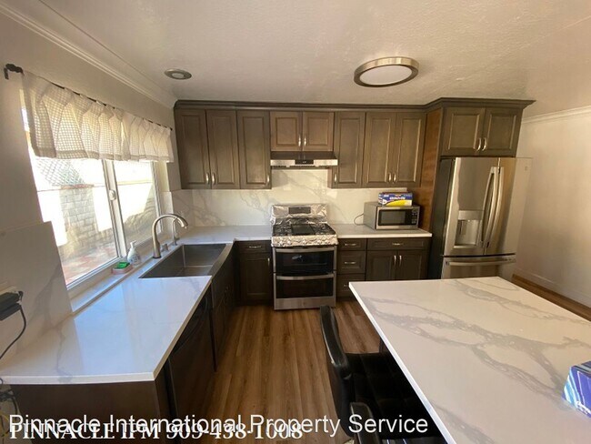 Building Photo - 4 br, 2 bath House - 365 S. Rock River Road