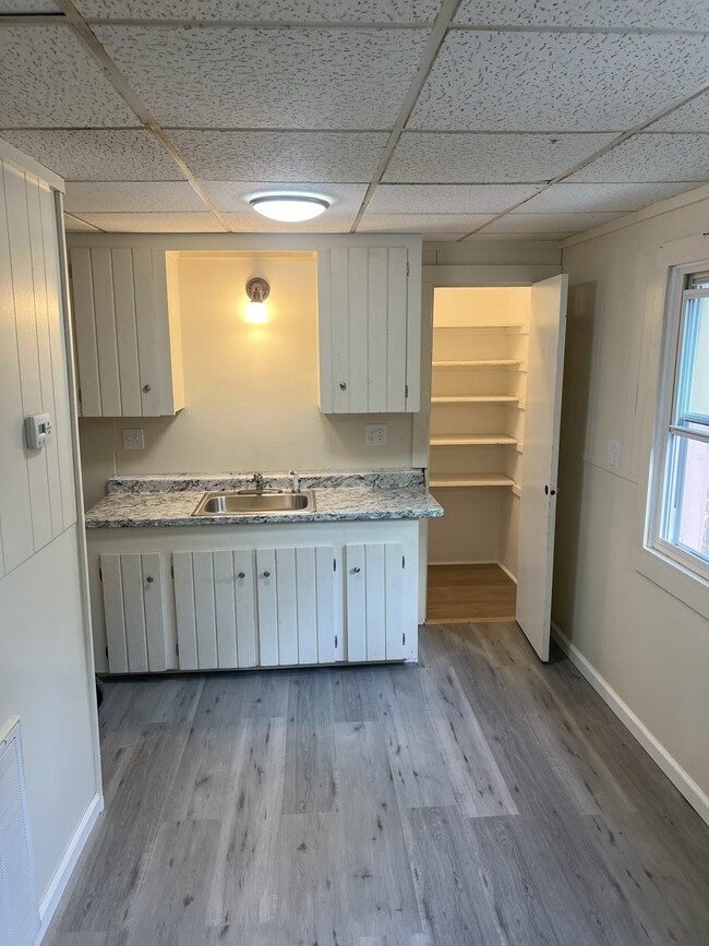 Another shot of the kitchen. - 122 Dewey avenue