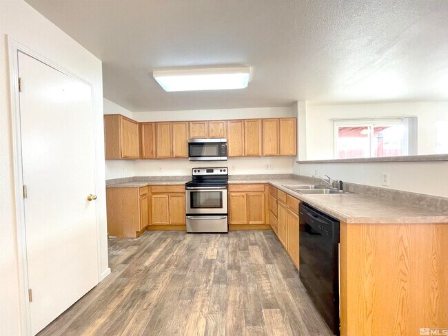 Foto del edificio - 8718 Sunset Breeze Dr