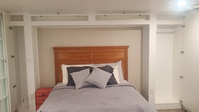 Custom Cabinets around bed - 3435 203rd St