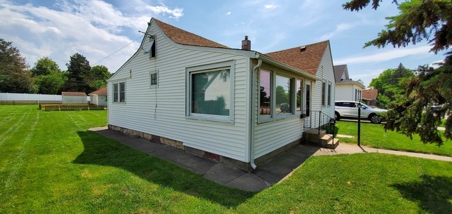 Side of house - 16074 New Ave