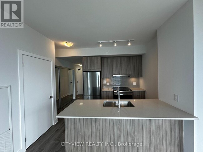 Photo du bâtiment - 430-4430 Square One Dr