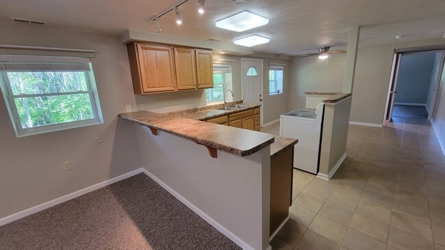 Bartop counter looking into kitchen space - 1818 Overland Ave SW