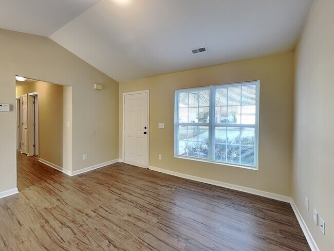 Building Photo - Bright & Easy-Living Home with Vaulted Cei...