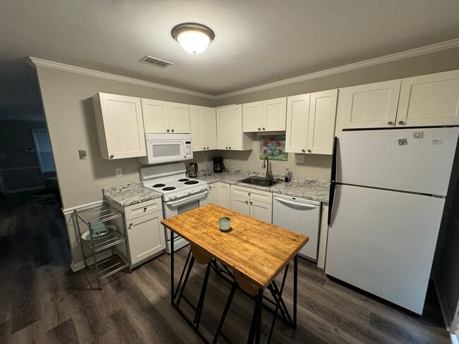 Building Photo - PETS CONDITIONAL + FURNISHED OPTION - Cute...