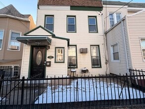 Building Photo - 1011 Paterson Plank Rd