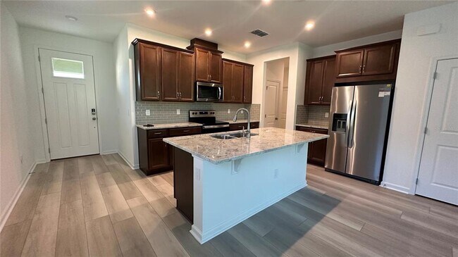 Building Photo - 3309 Canna Lily Pl