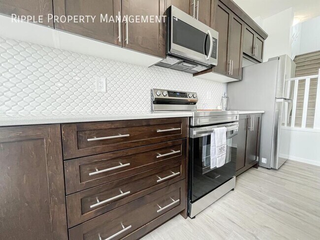 Building Photo - Modern 4 Beds, 2.5 Baths Single- Family | ...